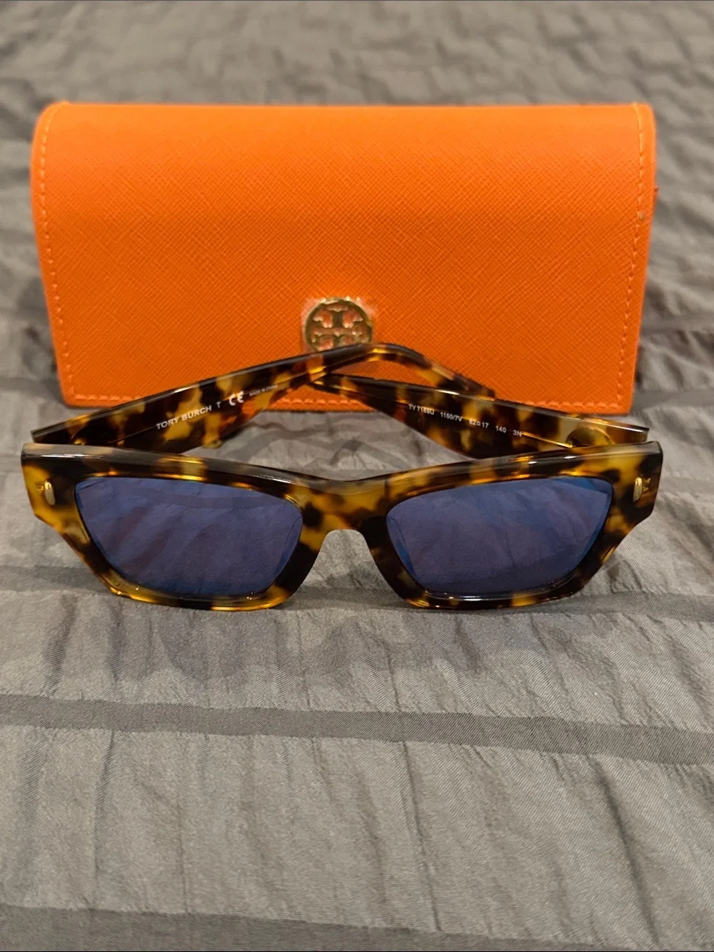 Tory Burch Tortoiseshell Sunglasses with Blue-Purple Lenses